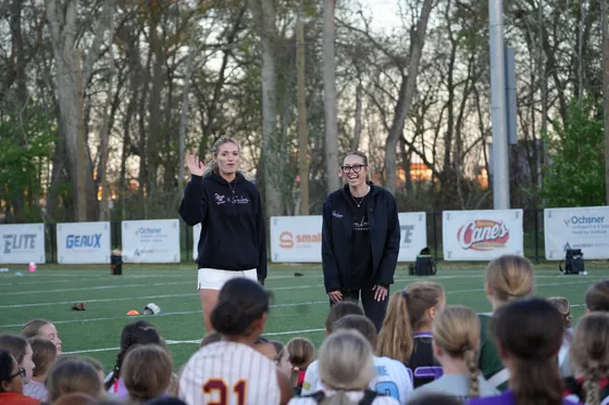 Montana Fouts speaking with athletes